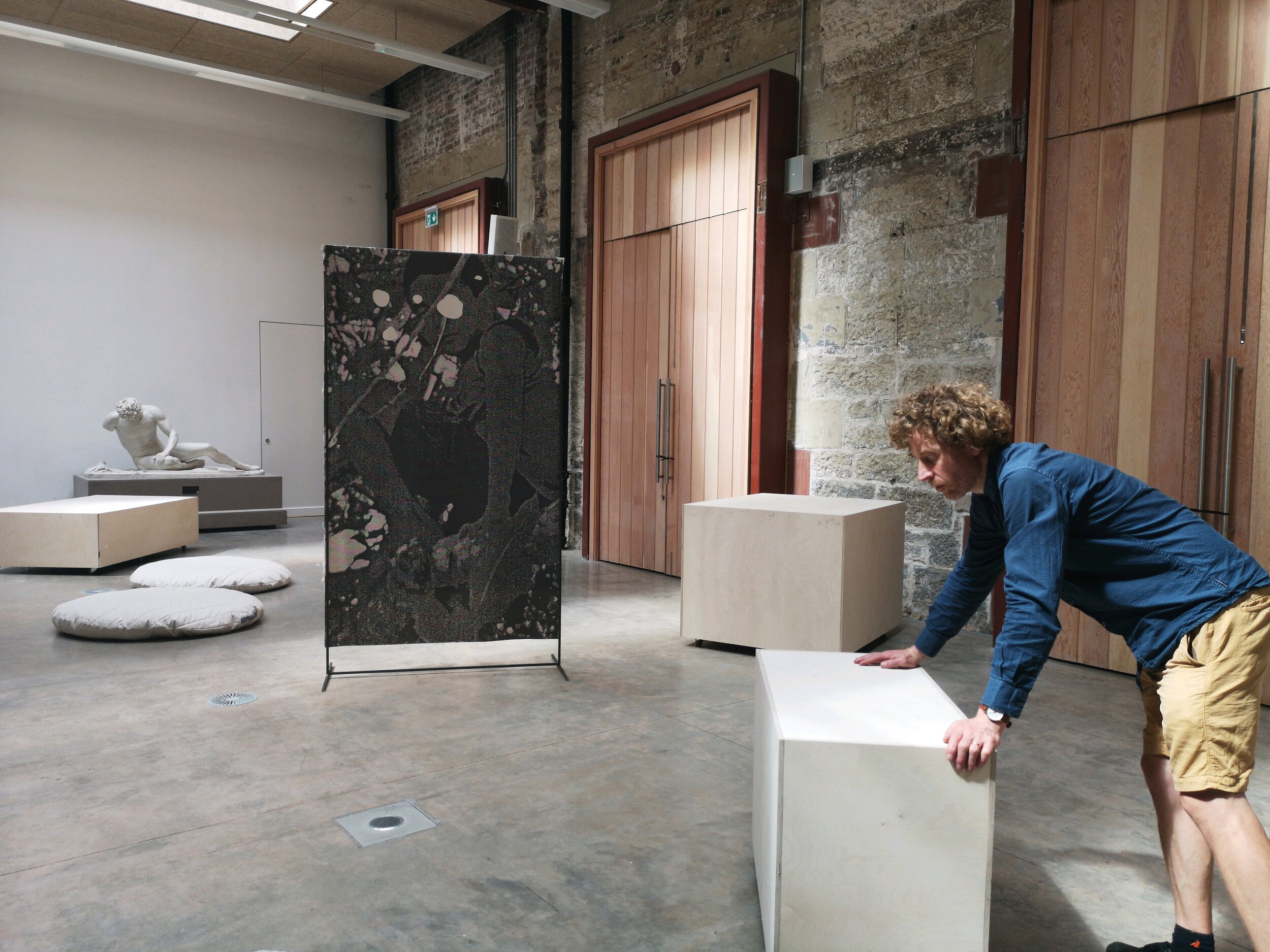 This is a picture of me testing Sonikebana, a nine channel sound piece for mobile loudspeakers that respond to movement. Photo Anna Chapman Parker.